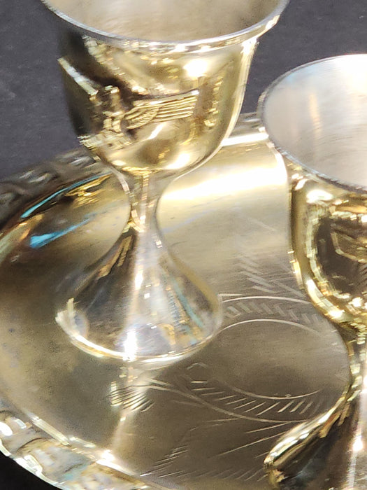 Title: Set of 4 Silver-Plated Schnapps Cups with Tray Featuring Brass Eagle and Swastika Embellishments