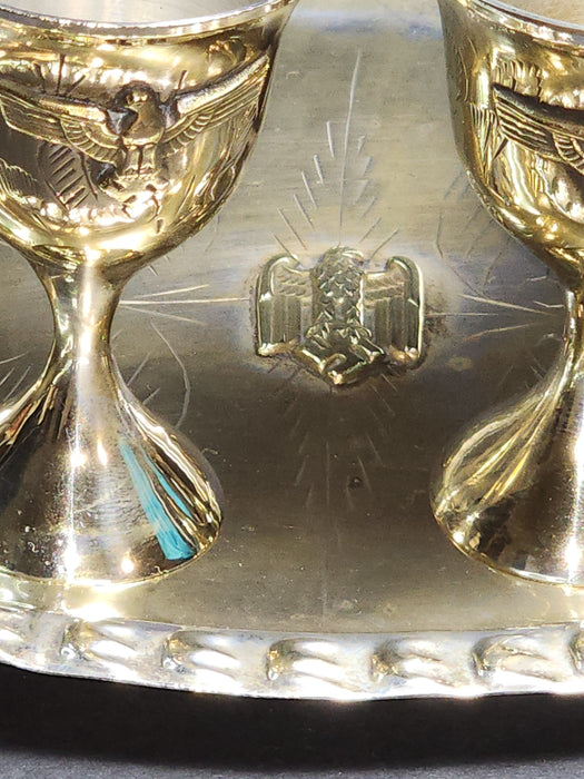 Title: Set of 4 Silver-Plated Schnapps Cups with Tray Featuring Brass Eagle and Swastika Embellishments