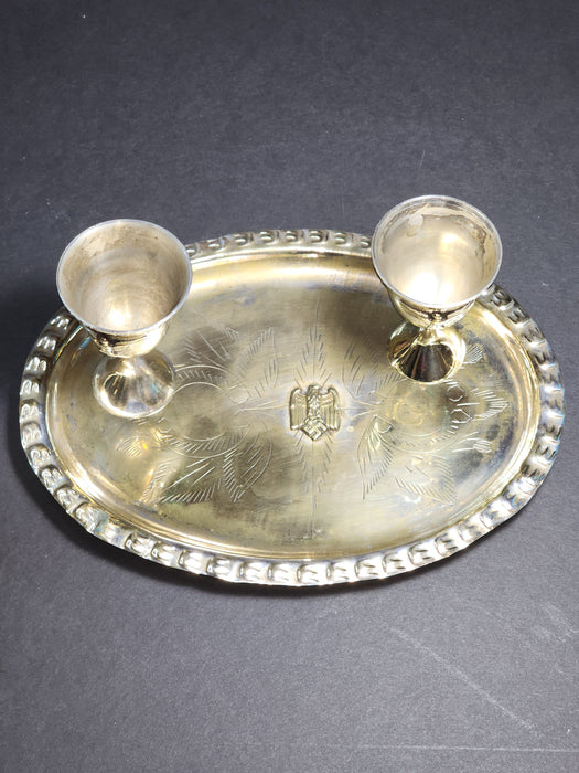 Title: Set of 4 Silver-Plated Schnapps Cups with Tray Featuring Brass Eagle and Swastika Embellishments