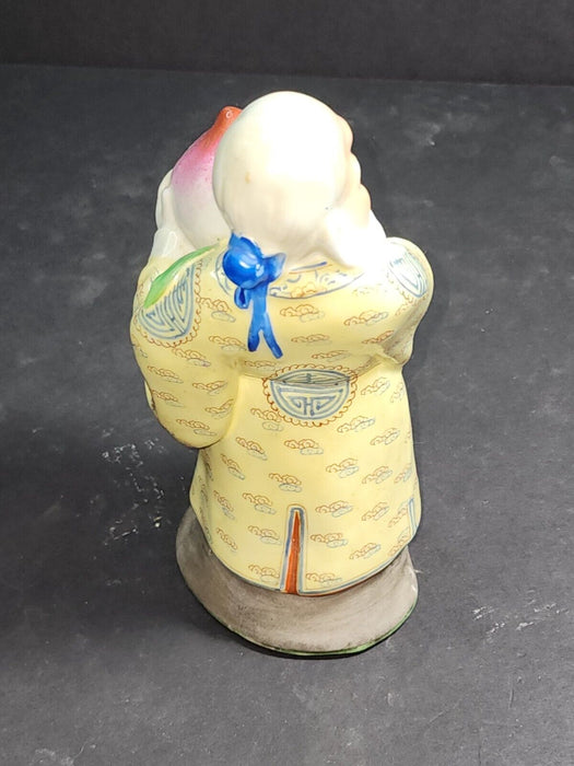 Asian man holding a turnip 7 " high artist marks on bottom, Antiques, David's Antiques and Oddities