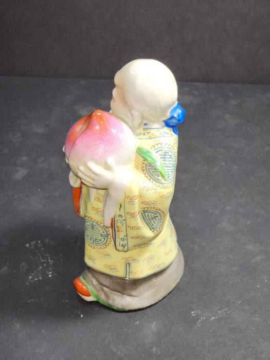 Asian man holding a turnip 7 " high artist marks on bottom, Antiques, David's Antiques and Oddities