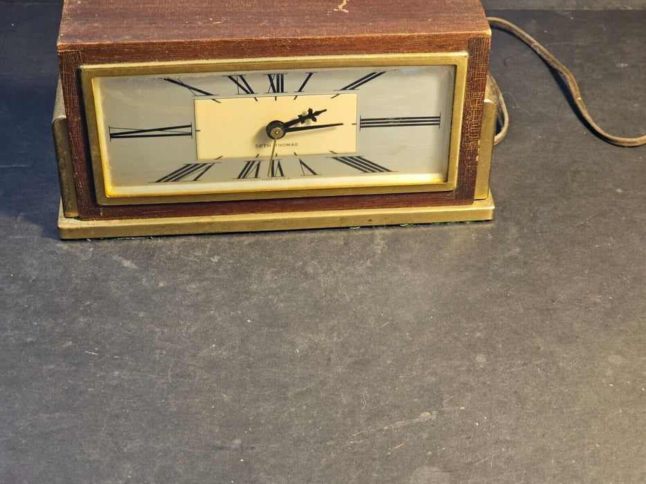 Seth Thomas Baxter-E Desk Clock Approx 8 1/2" x 4 1/4" tall.