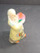 Asian man holding a turnip 7 " high artist marks on bottom, Antiques, David's Antiques and Oddities