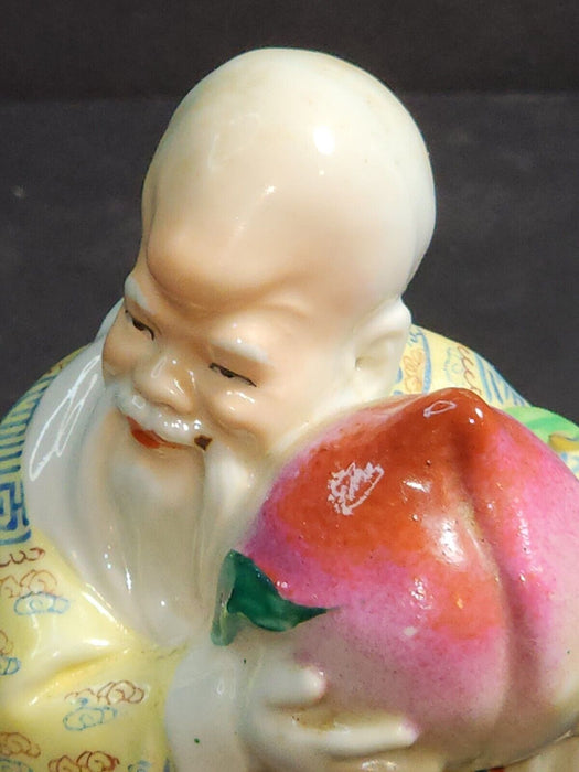 Asian man holding a turnip 7 " high artist marks on bottom, Antiques, David's Antiques and Oddities