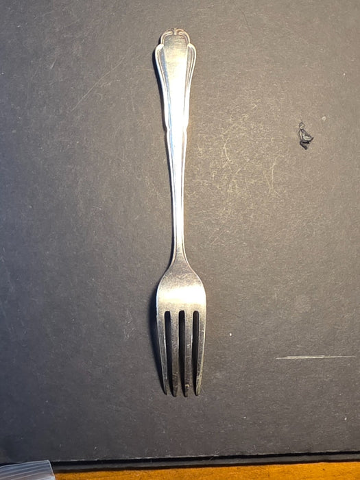 6998551
