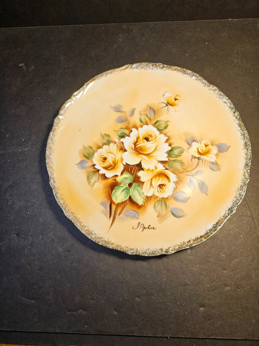 Hand painted plate floral yellow tones artist signed/ yellow/golden tones 10.5"