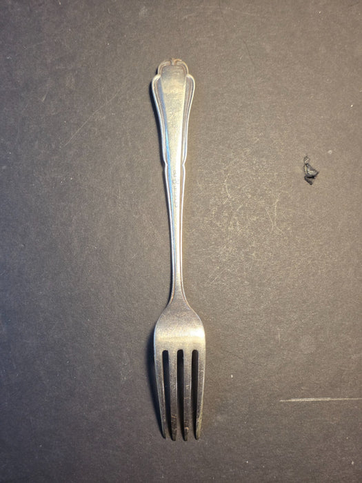 6998551