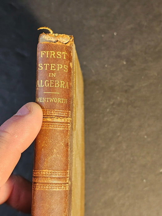 1891 copy of the first steps in algebra/by wentworth/student copy 5x7/
