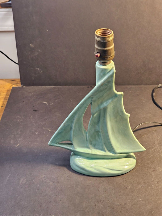 MCM green ceramic sailboat lamp. works but wire not through hole/9x12