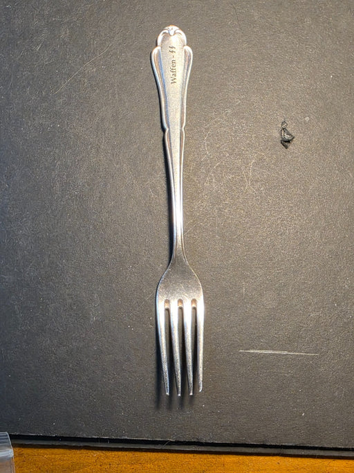 6998551
