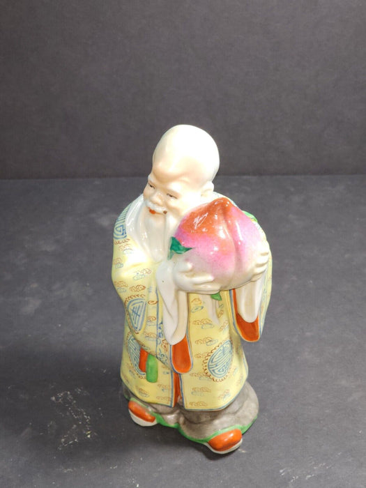 Asian man holding a turnip 7 " high artist marks on bottom, Antiques, David's Antiques and Oddities