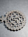 Round trivet cast iron black ornate design marked JHZ, Antiques, David's Antiques and Oddities