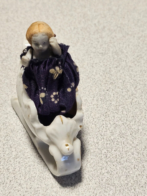 Small movable bisque doll in sled sled id made in japan . Christmas, Antiques, David's Antiques and Oddities