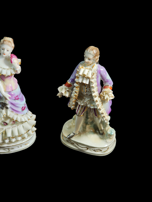 Pair of 6" figurines Man and woman Crossed swords on the man's base., Antiques, David's Antiques and Oddities