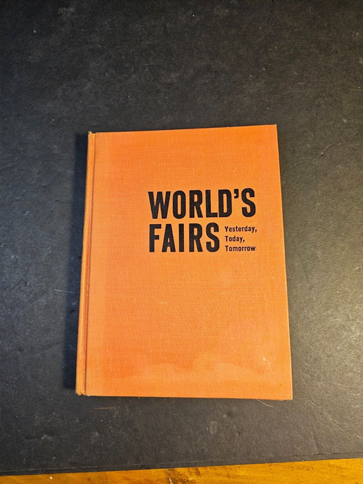 Worlds fair book dated 1962/64. period information/ 6x8 cloth cover