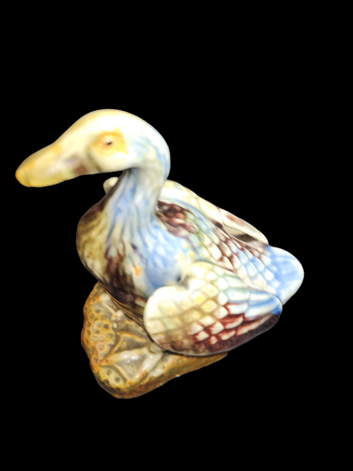 Early 20th century porcelain duck 6" tall course finished base., David's Antiques and Oddities