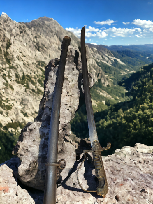 Title: WWII German Cavalry Sword with Brass Lion Head Handle by Carl Eickhorn