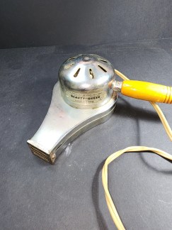 Beauty Queen MCM Hair Dryer. Works fine.