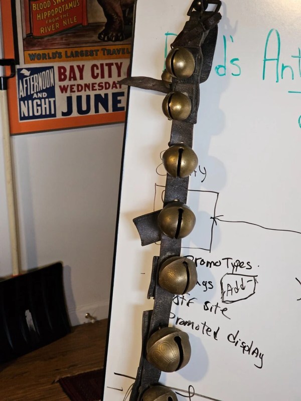 12 Graduated bells 36" Brass embossed design well used late 1800s. Bells are #