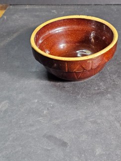 Small 4.5 " brown ware bowl 2.5 " high  design incised in the side.
