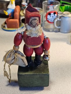 6.5" Movable wood santa 1950s/60s wood and cloth. red and green christmas