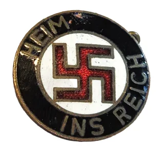 Black, White, and Red Enamel Pin with Swastika in Red Surrounded by White with Black Border, with "Ins Heim Reich" in German
