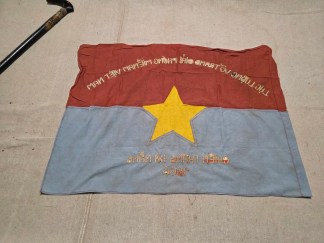 A rare, original Viet Cong (National Liberation Front of South Vietnam) flag from the Vietnam War, dated 1966. This 30x22 inch piece of military memorabilia is in very good condition