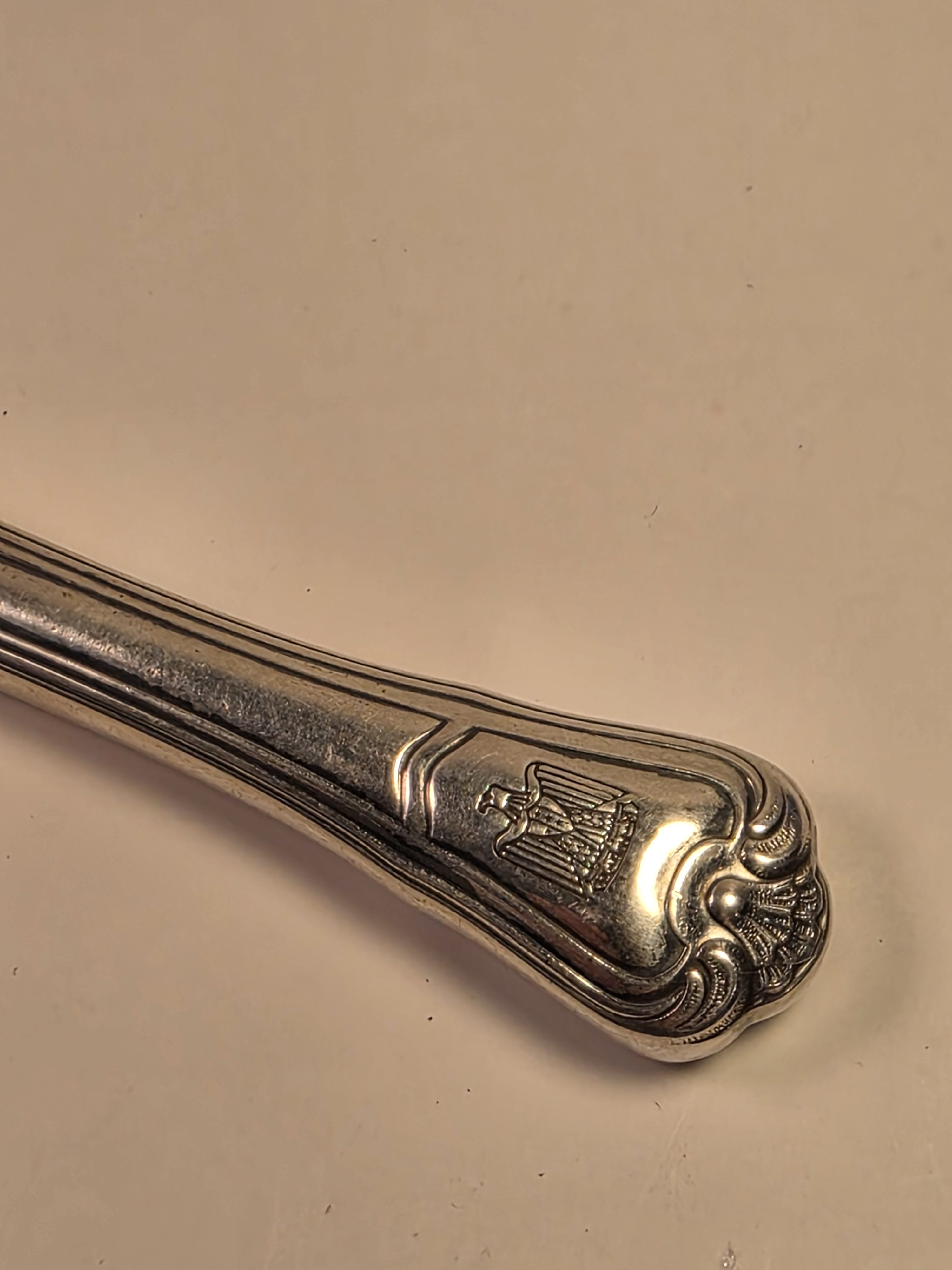 A single, authenticated Christofle knife from Saddam Hussein's Presidential Palace inventory