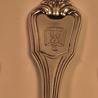 A grouping of eleven 11 Christofle silverplate dinner forks from Saddam Hussein's palace each engraved with the Iraqi Coat of Arms. Close-up of the Christofle and silverplate hallmarks.