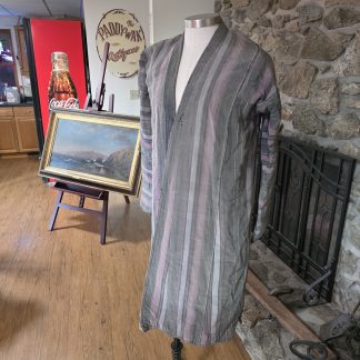 Full view of antique Soviet-Uzbek Tajik military robe on mannequin showing grey/pink stripes and red star-and-crescent patch.