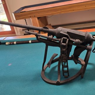 40 lb custom-made blacksmith sculpture resembling a military weapon, fabricated from vintage French Fry Machine parts.