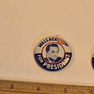 Two matching 1.5-inch George Wallace 1968 campaign buttons with his portrait and a blue Wallace for President border