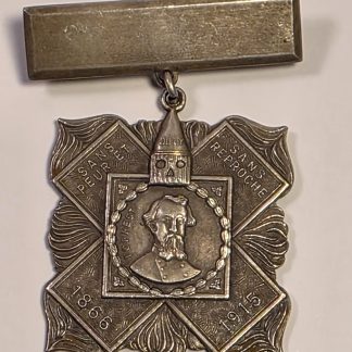 Reverse side of KKK Hero Cross medal with Whitehead & Hoag maker's mark and William Joseph Simmons Imperial Wizard inscription.